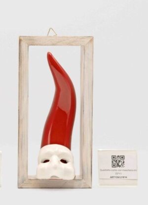 Corno con maschera in cornice